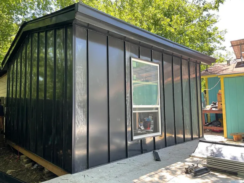 Black standing seam metal wall panels for Roof Inspection in Elmhurst